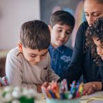 Group of children learning writing in preschool